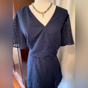 NWT. Navy Blue short sleeve, mock wrap blouse. Sz 18-20. Belted. Chevron stripe.